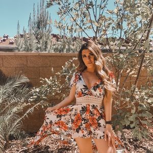 Rue 21 floral romper (high-low)  Brand New!